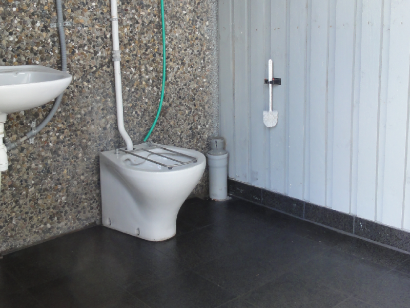 tømning af toilet og spildevand